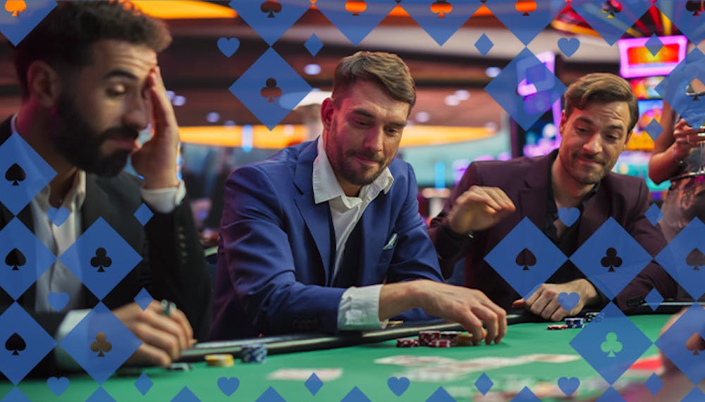 someone rubbing thier forehead showing a tell at a live poker table