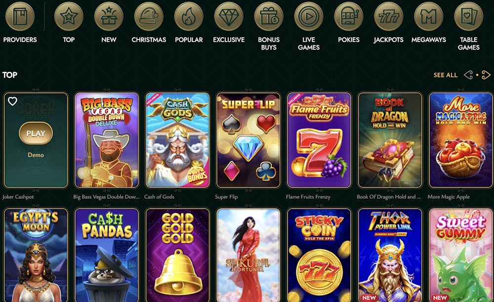 Top online slot games at Cashed Casino, including Joker Cashpot, Big Bass Vegas Double Down Deluxe, Cash of Gods, and Flame Fruits Frenzy, displayed with navigation categories like Top, New, and Popular.