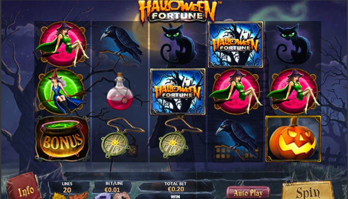 A screenshot of the Halloween Fortune online slot game featuring spooky-themed symbols on the reels, including witches, black cats, ravens, glowing potions, pumpkins, and Halloween Fortune logo symbols. The background depicts a dark and eerie forest with a haunted house silhouette. The game interface shows