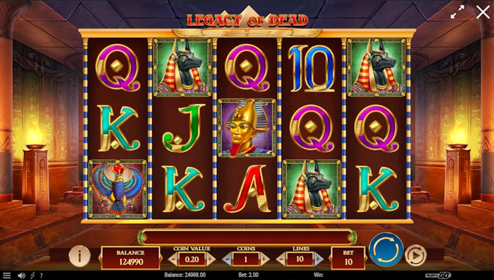 Legacy of Dead slot game interface featuring reels with Egyptian-themed symbols, including pharaohs, scarabs, and Anubis, set within a grand ancient temple background illuminated by golden light.