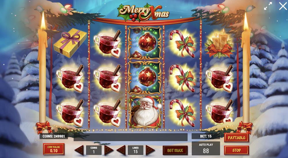 main reels of the merry xmas slot with bonus symbols and regular symbols such as wine, candy canes and baubels