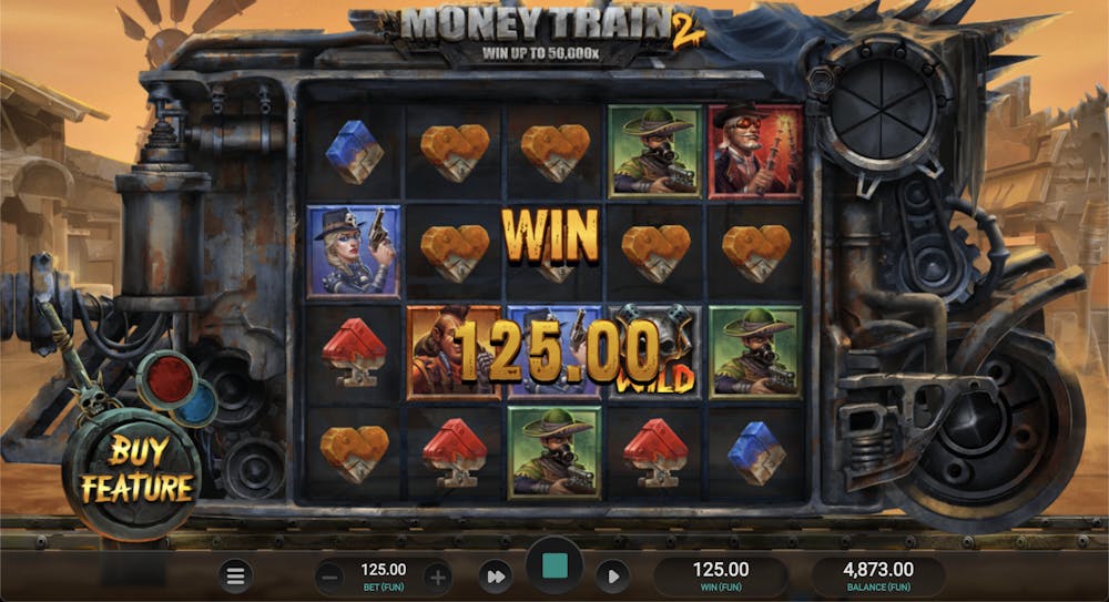 A Money Train 2 slot game screenshot showing a winning spin with a payout of 125.00. The reels display rugged outlaw characters, metal heart symbols, and a skull Wild icon, set against a worn, industrial train carriage in a dusty Wild West town. The 