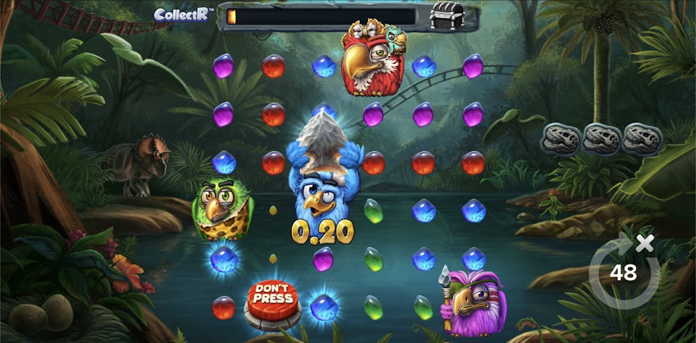 Gameplay scene from Pirots 2 CollectR slot featuring vibrant bird characters in a lush prehistoric jungle. Blue and red gem clusters appear on the grid, with a ‘Don’t Press’ button highlighted at the bottom. A triceratops lurks in the background alongside a river, surrounded by dense greenery and dinosaur fossils. A chest icon and progress bar are visible at the top of the screen.