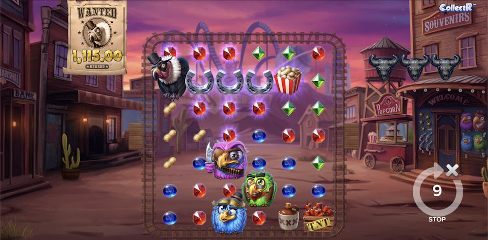 Gameplay screen of the Pirots 3 slot game featuring a Western town theme with detailed visuals of saloons, a souvenir shop, and a popcorn stand. The game grid displays colorful gem symbols, horseshoes, dynamite, and character symbols like a vulture in a top hat, a purple bird with a bandana, and a green bird wearing a leather strap. The background includes cacti and a roller coaster track under a pink sunset sky. A 'Wanted' poster with a reward of 1,115 coins appears in the top left corner.