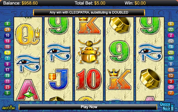 Queen of the Nile II pokie game showing ancient Egyptian-themed symbols like scarabs, eyes of Horus, and golden rings on the reels, with a total bet of $5.00 and a balance of $958.60