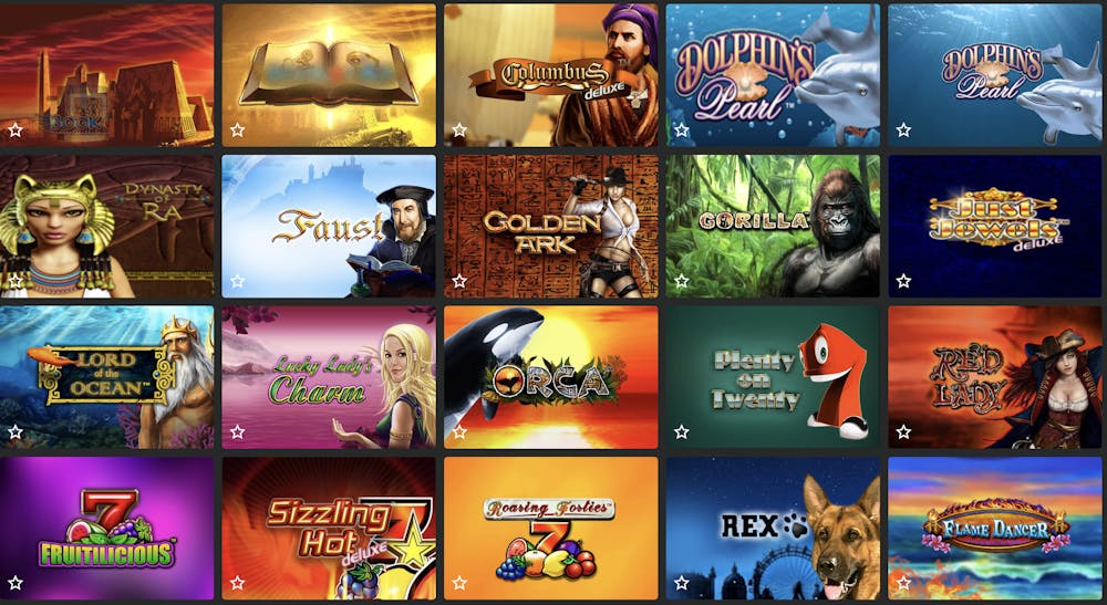 Spicy Jackpots casino games section featuring a variety of popular slots such as Book of Ra, Dolphin’s Pearl, and Sizzling Hot Deluxe with vibrant, iconic themes.