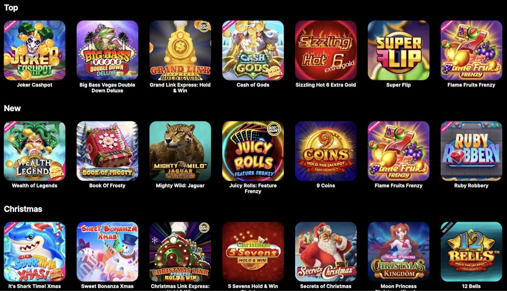 Spinit casino games selection showcasing top games like Joker Cashpot, Big Bass Vegas, Grand Link Express, and festive-themed games such as Book of Frosty and Christmas 5 Sevens Hold & Win, presented in a grid layout.