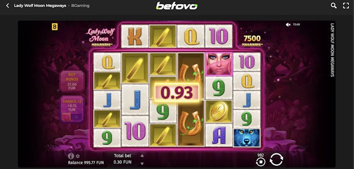 The Lady Wolf Moon Megaways slot game in action, showing the reel layout with a winning spin, featuring symbols like horseshoes, coins, and the lady wolf.